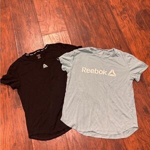 Reebok woman’s Black and Blue T-Shirts